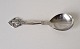 Serving spoon 
in silver and 
steel decorated 
with bunch of 
grapes. Stamp: 
Cohr - the 
three ...