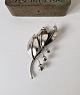 A. Michelsen 
silver brooch 
in the shape of 
a lily of the 
valley, the 
three small 
flowers are ...