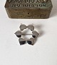 Hans Hansen 
heart brooch in 
sterling 
silver. 
Stamped: Hans 
Hansen - 
Denmark - 925. 
Diameter ...