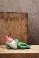 Decorative old 
painted 
terracotta 
Santa Claus 
with fine 
patina. 
H: 5.5cm. L: 
11cm.