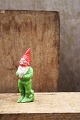 Decorative old 
painted 
terracotta 
Santa Claus 
with fine 
patina. H: 9cm.