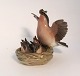 Dahl Jensen. 
Porcelain 
figurine. Bird 
on nest. Model 
# 1349. Height 
12.5 cm. (1 
quality)