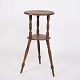 Antique pine 
side/flower 
table from the 
1880s. Two-tier 
with turned 
legs.
— Period: 
1880s
— ...