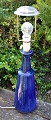 Ceramic table 
lamp with blue 
glaze, 20th 
century. 
Denmark. With 
flutes. 
Unstamped. 
Height ...