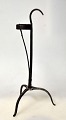 Baroque clamp 
candlestick, 
18th century. 
Denmark. Made 
of iron. On 
three legs. H.: 
25.5 ...