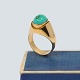 Ring of 14k gold, set with a turquoise