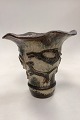 Royal 
Copenhagen 
Stoneware Vase 
by Jais Nielsen 
No. 20102
Vase with wavy 
edge. Motif of 
warrior ...
