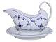 Royal 
Copenhagen Blue 
Fluted Plain 
gravy boat on 
fixed platter.
The factory 
mark shows, 
that ...
