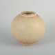 Royal 
Copenhagen
Vase, 
1930/40s.
Organically 
shaped 
spherical vase 
in wheel-thrown 
stoneware ...