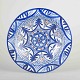 Italian Studio 
Potter
Dish, 1960s.
Wheel-thrown 
faience dish 
with 
hand-painted 
decoration in 
...