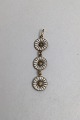 Georg Jensen 
Sterling Silver 
Marguerit 
(Daisy) Pendant 

Measures 5.5 
cm (2.16 inch) 
Weight 3.5 ...