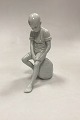 Royal 
Copenhagen 
Blanc de Chine 
Figurine - Boy 
on Stone No. 
520. Designed 
by Ingeborg 
Plockross ...