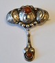 Danish Art 
Nouveau brooch 
in silver with 
amber, 20th 
century. Hans 
Jensen & Co, 
Copenhagen ...