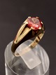 14 carat gold 
ring size 63 
with red stone 
item no. 622305