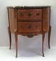 Dresser, Denmark, 
Louis XVI 
style, 20th 
century. In 
walnut with 
intarsia, with 
bronzer ...