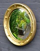 Bronzed 
butler's 
mirror, 19th 
century 
England. With 
concave glass. 
Dia.: 45 cm.