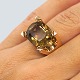 Just Andersen; 
A ring of 14k 
gold, set with 
a large topaz. 
Ring size: 51.
Stamped "585 
Just ...