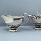 Georg Jensen; A set with sugar bowl and creamer of ...