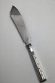 O.V. Mogensen 
Silver / 
Stainless Steel 
Champagne Layer 
Cake Knife 
(Small)
Measures 23.5 
cm ...