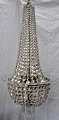 Antique prism 
chandelier. L: 
94 cm. Dia: 46 
cm. With 995 
prisms and 
glass top and 
glass rod. For 
...