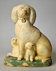 Money box in 
cold-painted 
clay, 19th 
century. 
Bornholm. 
Denmark. Money 
box in the 
shape of a ...
