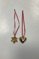 Georg Jensen 
Christmas 
Collectibles 
Ornament 2010 - 
Heart and Star. 

Design: Lene 
Munthe. ...
