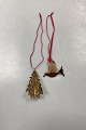 Georg Jensen 
Christmas 
Collectibles 
Ornament 2014 - 
Fir Tree and 
Dove. Design: 
Karen Bit 
Vejle. ...