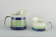Rörstrand, 
Sweden
“Lotta” jugs, 
1970s/80s.
Two jugs in 
faience with 
white glaze, 
green and ...