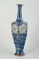 Royal Doulton, 
England
Art nouveau 
vase, 1920s.
Slender, tall 
chamotte vase 
with blue and 
...