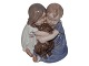 Royal 
Copenhagen 
Figurine, Boy, 
girl sitting 
with a 
dachshund.
The factory 
mark tells, 
that ...