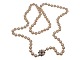 Long Akoya pearl necklace with 14 carat white gold pendant with blue sapphires
