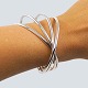 Georg Jensen; 
Alliance bangle 
in sterling 
silver.
Designed by 
Allan Scharff.
Inside 
dimensions ...