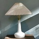 Le Klint table 
lamp model 311 
with lamp base 
of white 
opaline glass 
with pleated 
shade. Shade 
...