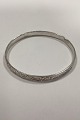 Mexican Armring 
Bangle in 
Silver
Inner Width: 
65 mm / 2.56 
inch  
Weight: 15,3 g 
/ 0.54 oz