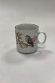 Mads Stage 
Annuel Mug - 
Goldcrest 2004. 
Manufacturer: 
Seltmann 
Weiden. 
Measures 7.5 
cm x 8.3 ...