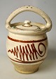 Antique Danish 
maternity pot 
in glazed red 
clay, 19th 
century. With 
white 
underglaze and 
red and ...