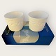 Royal 
Copenhagen, 
Silhouette, 
tealight candle 
holders with 
dancing elves, 
2 pieces in 
original box.
