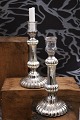 A pair of 19th 
century 
candlesticks in 
poor man's 
silver (Mercury 
silver glass) 
with a fine ...