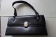 Bag black with 
a good closing 
possibility
Inside pockets
L: 23cm
H: 12,5cm
W bottom: ...