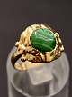 Georg Jensen 18 
karat gold ring 
#111B size 56 
with turquoise 
with stamp 
before 1945 
item no. 623553