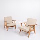 Set of two 
original 
“Cigar” 
armchairs, 
model GE 240, 
designed by 
Hans J. Wegner 
and 
manufactured 
...