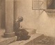Peter Ilsted 
(1861–1933)
“Girl by 
Column”.
Mezzotint.
Atmospheric 
interior scene 
depicting ...