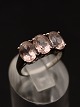 9 carat white 
gold ring size 
56 with 3 light 
pink stones 
item no. 623829