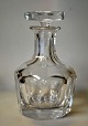 Orrefors crystal carafe, 20th century. Sweden. Cut octagonal body and stopper. Stamped: Orrefors ...