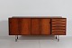 Arne Vodder
Sideboard of 
rosewood on 
metal legs
with two 
sliding doors 
behind which 
...