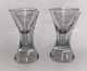 Pair of 
hourglass-
shaped Masonic 
glasses. Both 
engraved with 
the Star of 
David. One 
glass with ...
