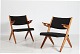 Dansk Møbeldesign
Par lette easy chairs
af massiv eg og teak