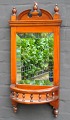 English wall 
mirror in 
mahogany with 
shelf, 19th 
century.