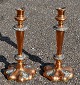 A pair of 
English copper 
candlesticks 
with pewter, 
19th ...