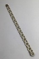 A Michelsen 
Gilded Sterling 
Silver 
Marguerit 
(Daisy) 
Bracelet
Measures 19 cm 
(7.48 inch) 
Weight ...